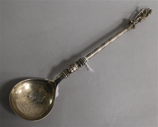A Norwegian 835 standard white metal ladle, By Marius Hammer, the terminal cast with St Christopher with a child, 30cm.